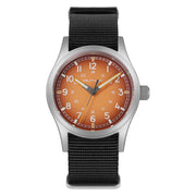 Orange dial field watch on a black nylon strap