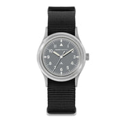 Gray-dial field watch on a black nylon strap