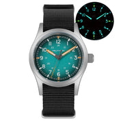 Teal blue dial field watch with glow-in-the-dark inset