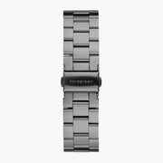 Gunmetal link bracelet with its clasp, displayed vertically.
