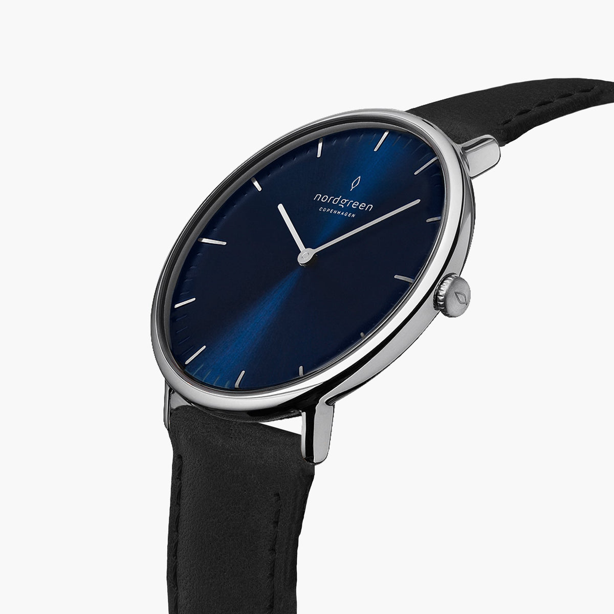 Angled view of the silver-tone case and crown with the blue dial and black strap.