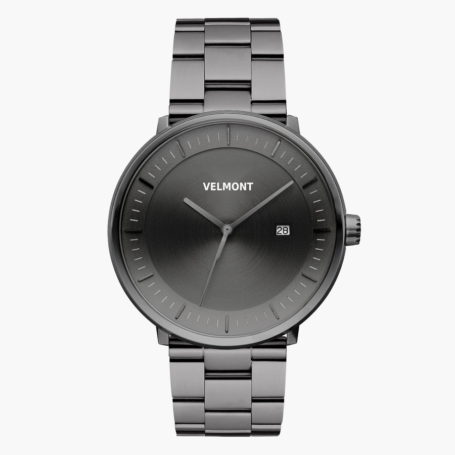 Monochrome gunmetal watch with a sunburst gray dial and link bracelet.