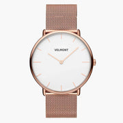 Rose gold-tone watch with a white dial on a rose gold-tone mesh strap.