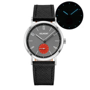 Gray-dial watch with red small-seconds sub-dial and glow inset