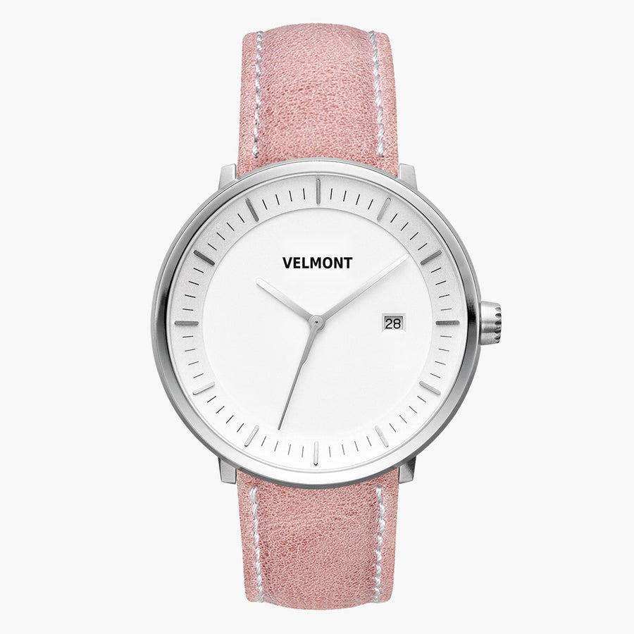 Watch with a white dial and silver-tone case on a dusty pink strap.