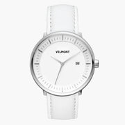 All-white look: white dial and silver-tone case on a white strap, front view.