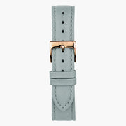 Dove gray strap with a rose gold-tone pin buckle, laid out flat.