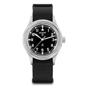 Black-dial field watch on a black nylon strap, front view