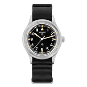Black-dial field watch with cream hands, front view