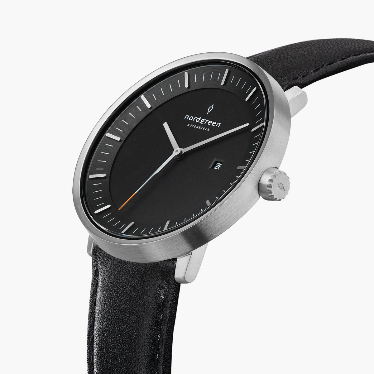 Three-quarter view of the silver-tone case, black dial and orange-tipped seconds hand.