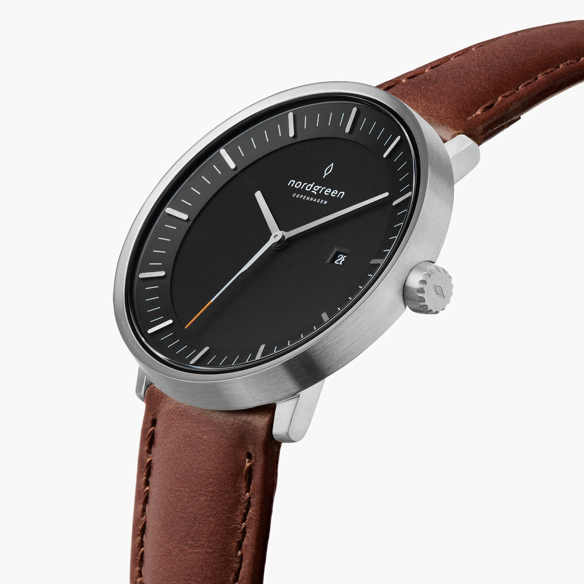 Three-quarter view of the silver-tone case, black dial and date window.