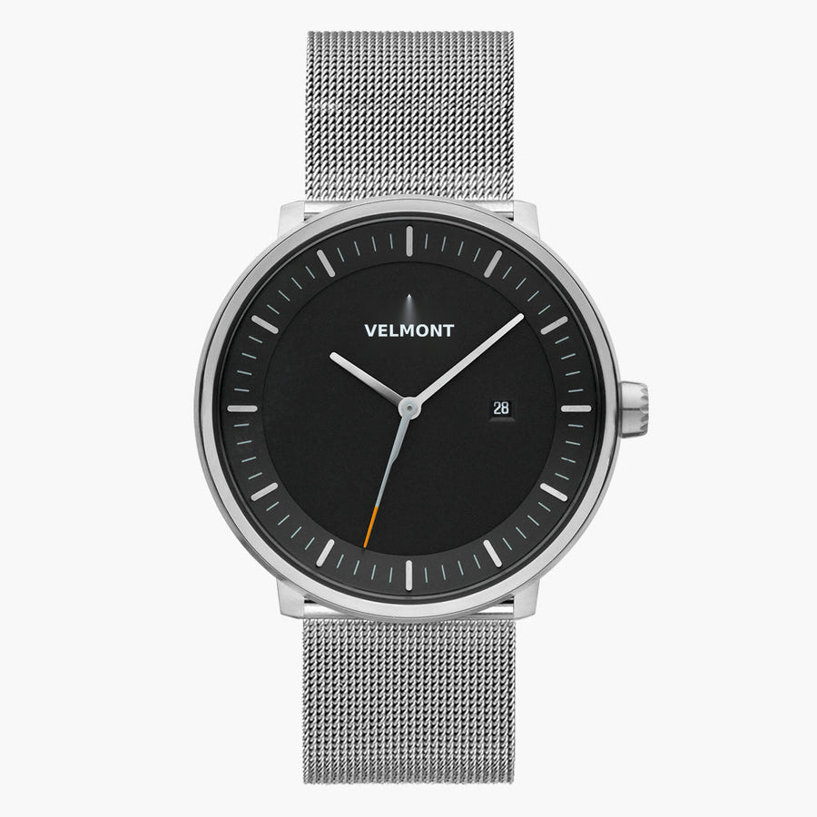 Straight-on look at the black dial and silver-tone case with its silver-tone mesh strap.
