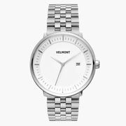 Front view of a silver-tone watch with a white dial on a silver-tone link bracelet.