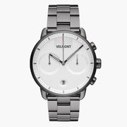 Chronograph-style watch with a white dial on a gunmetal link bracelet, front view.