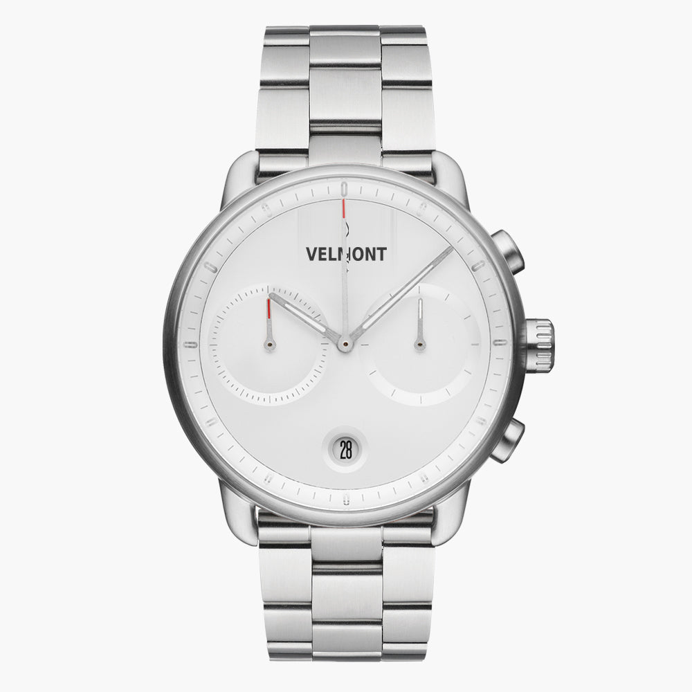 Chronograph-style watch with a white dial on a silver-tone three-row bracelet.