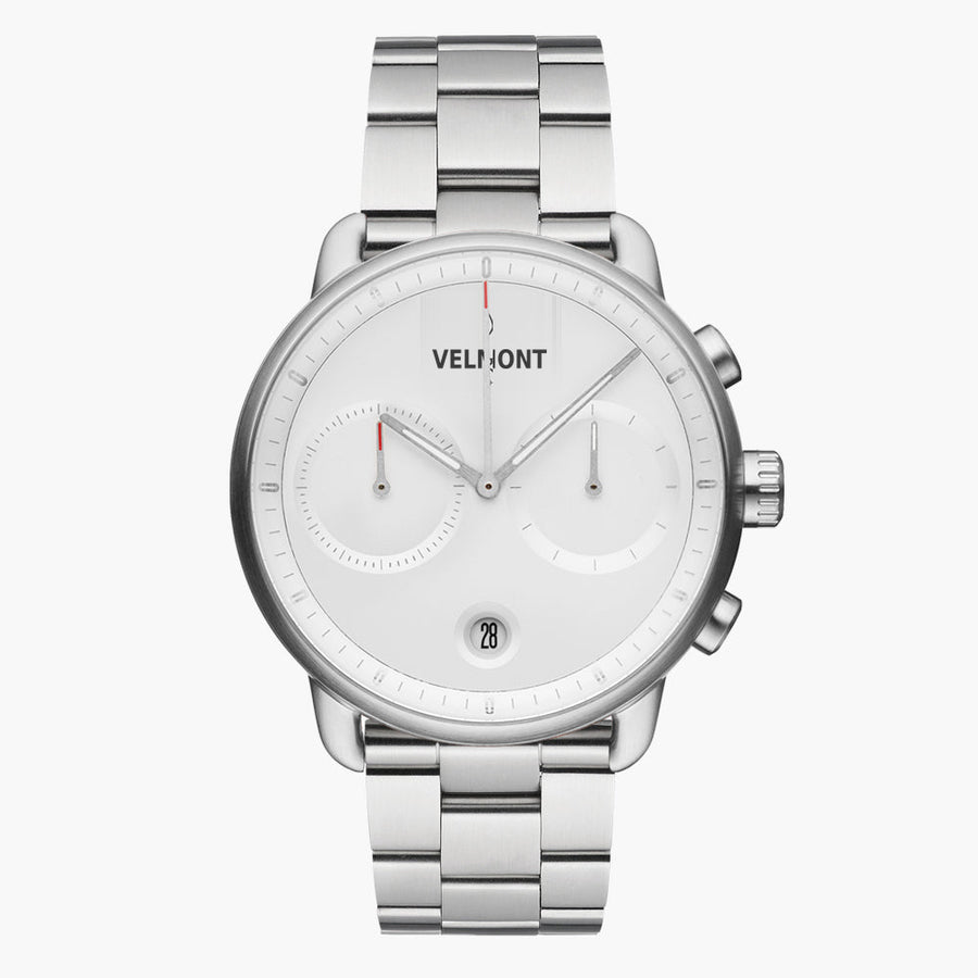 Chronograph-style watch with a white dial on a silver-tone three-row bracelet.