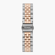 Detached two-tone silver and rose gold-tone link bracelet fastened with a silver-tone fold-over clasp.