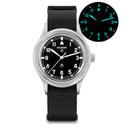 Black-dial field watch with glow inset