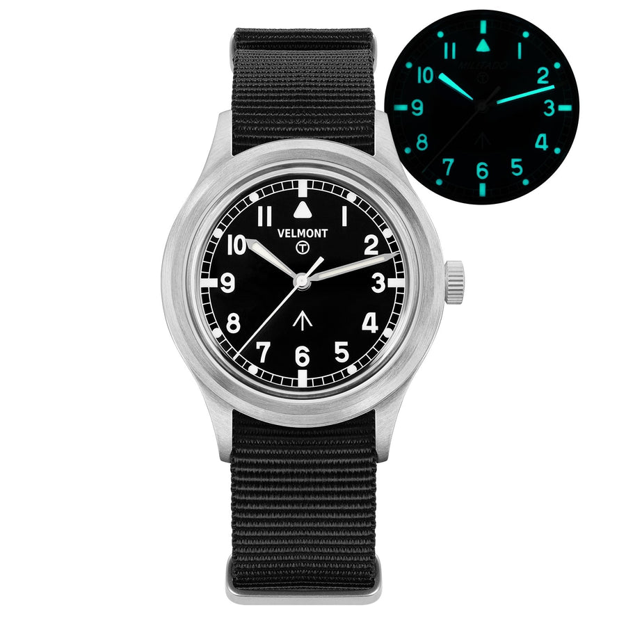Black-dial field watch with glow inset