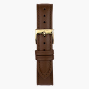 Brown strap with tonal stitching and a gold-tone pin buckle.