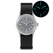 Gray-dial military watch with glow inset