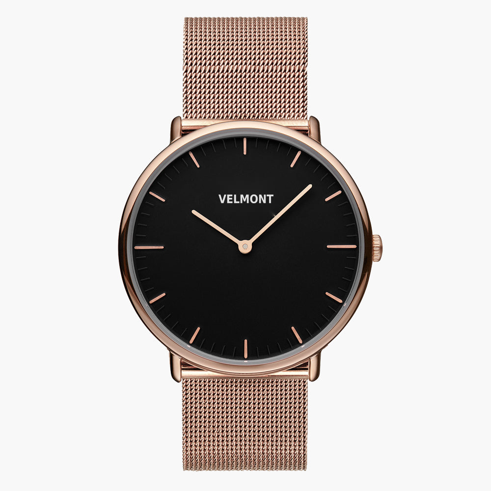 Watch with a black dial and rose gold-tone case on a rose gold-tone mesh strap, shown from the front.