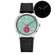 Mint green dial watch with red small-seconds sub-dial and glow inset