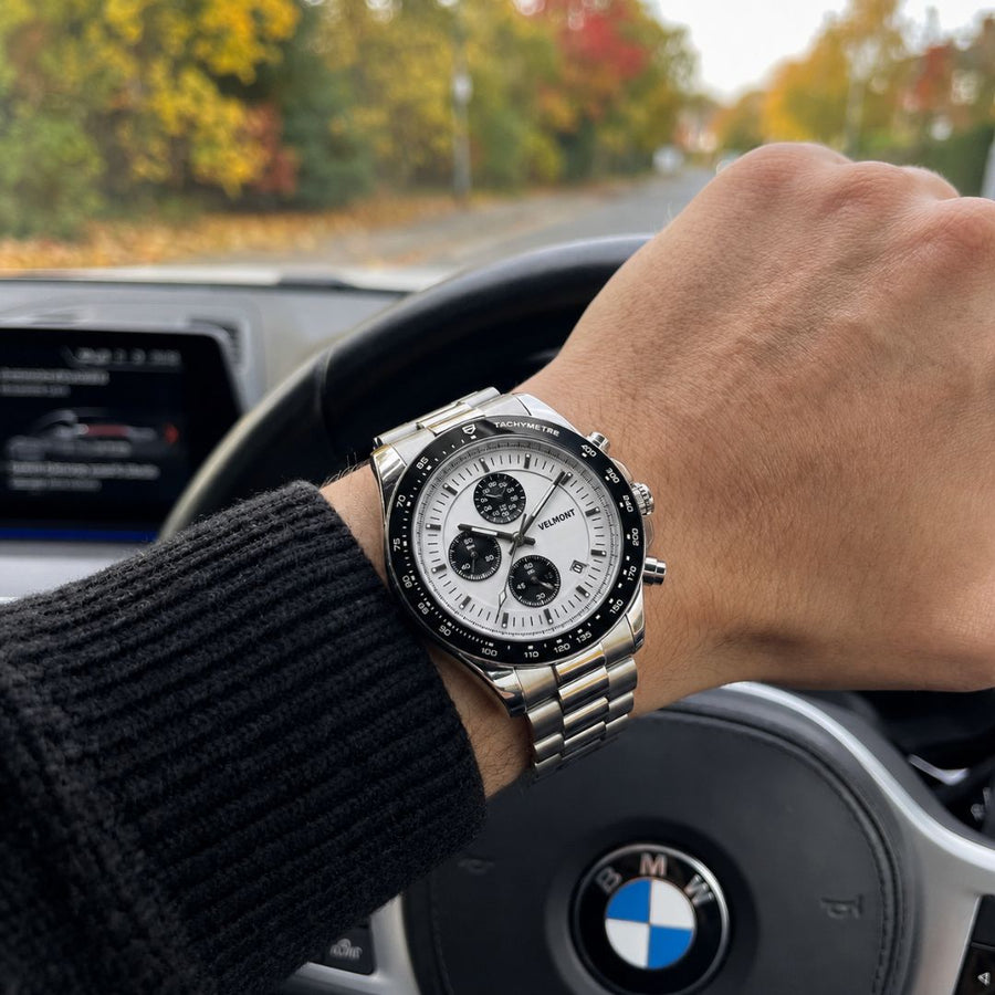 Panda chronograph on a wrist at the steering wheel