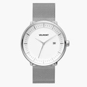Front view of a silver-tone watch with a white dial on a silver-tone mesh strap.