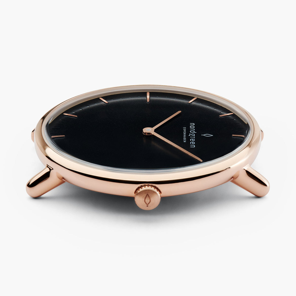 Profile of the watch head in rose gold-tone, crown facing the camera.