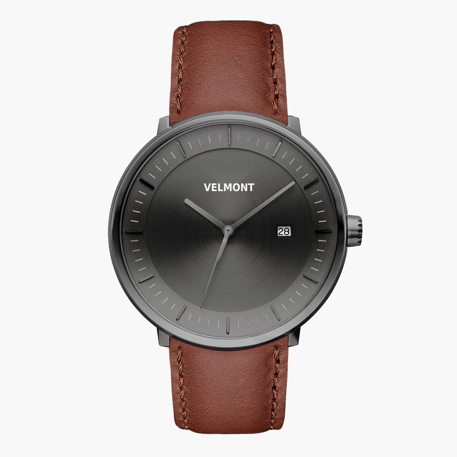 Front view of a gunmetal watch with a gunmetal gray sunburst dial on a brown strap.