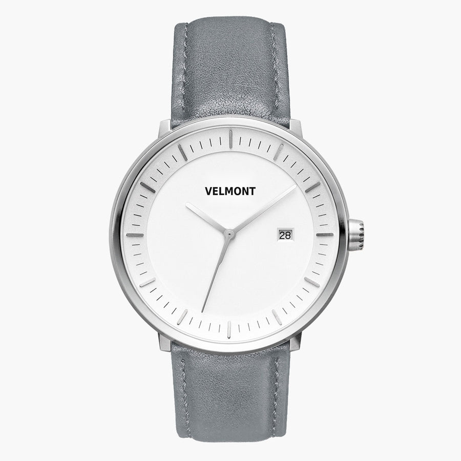 Watch with a white dial and silver-tone case on a gray strap, shown from the front.