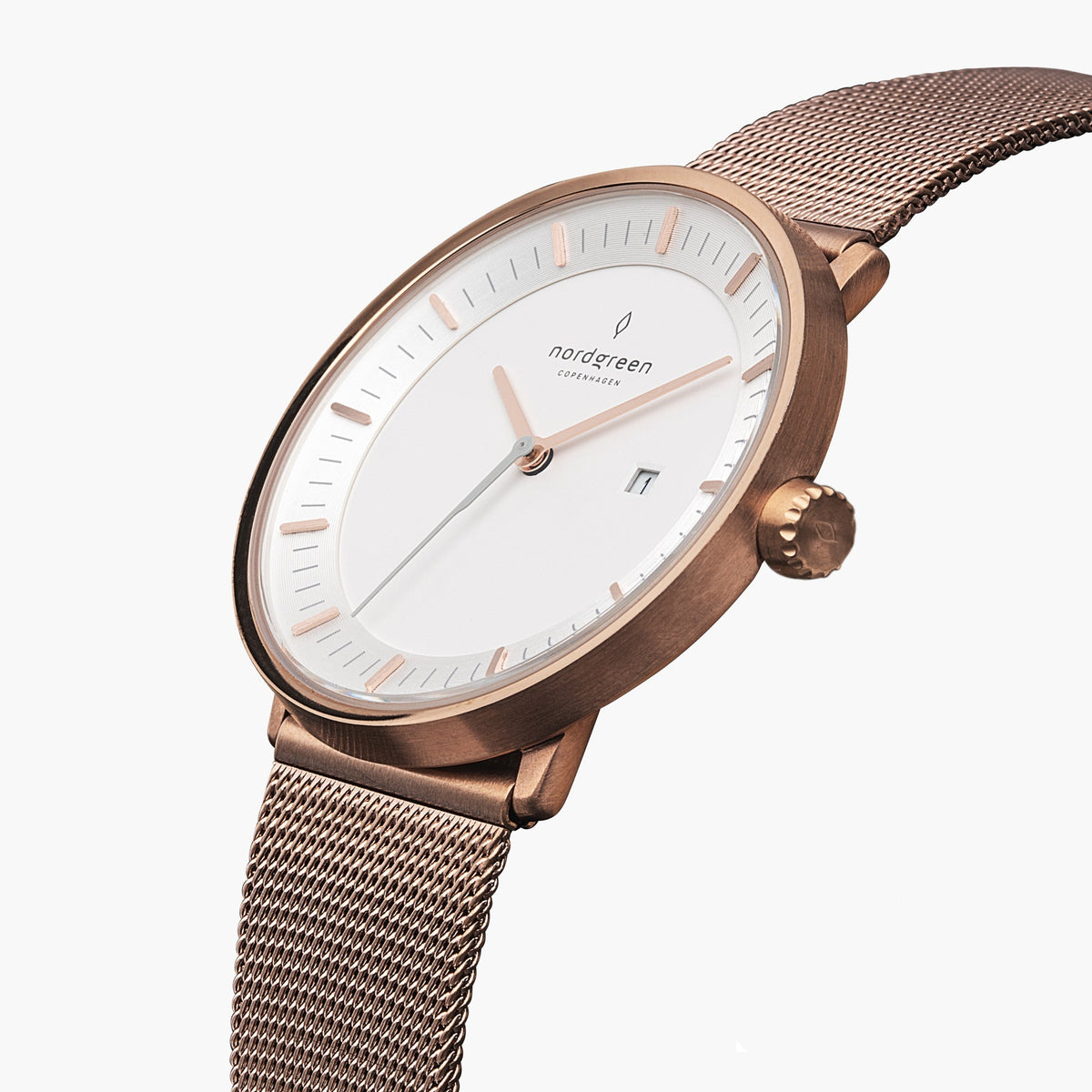 Three-quarter view of the watch showing the white dial and rose gold-tone mesh strap.