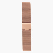 Rose gold-tone mesh strap with its fold-over clasp, displayed vertically.