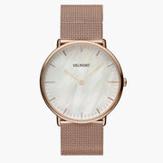 Watch with a pearlescent white dial and rose gold-tone case on a matching mesh strap.