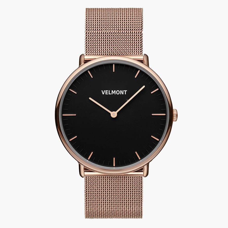Watch with a black dial and rose gold-tone case on a rose gold-tone mesh strap, shown from the front.