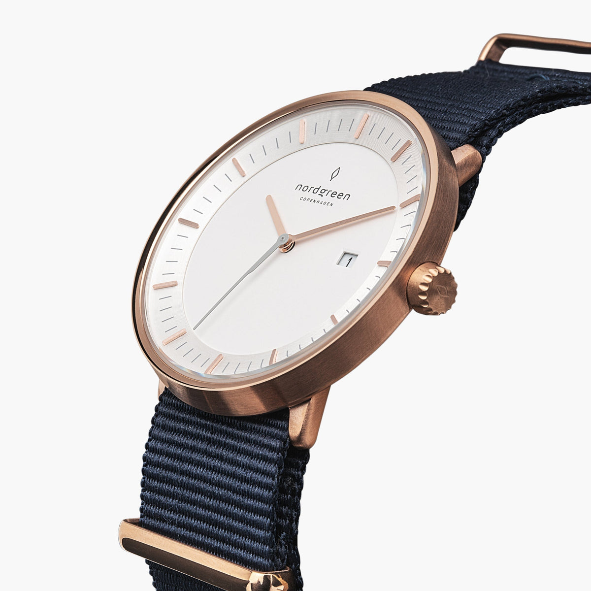 Angled view of the white dial with its date window and rose gold-tone crown.