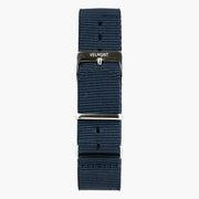 Navy woven strap with a silver-tone buckle and metal keepers.