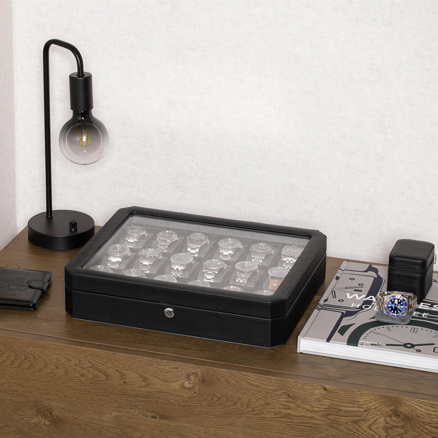 Closed eighteen-watch case on a wooden desk