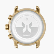 Gold-tone case back with a pale engraved medallion.