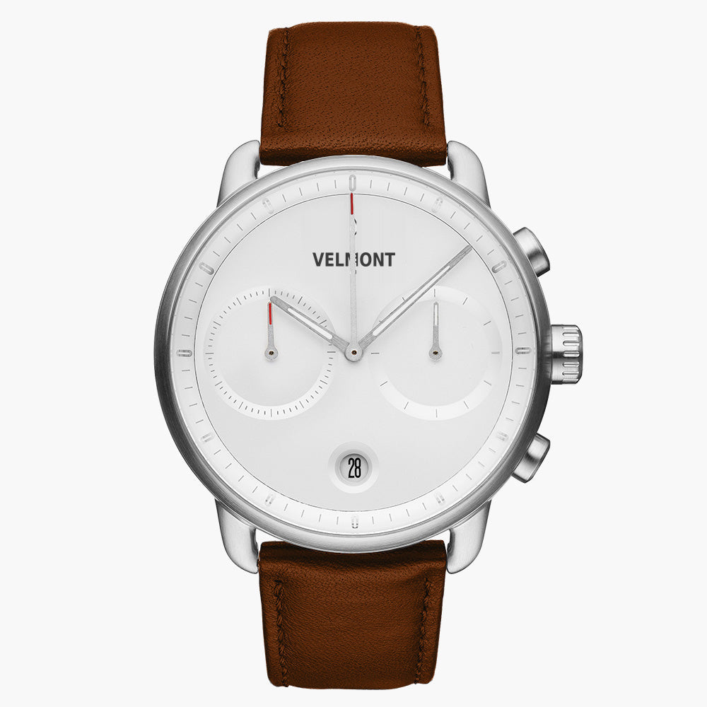 Chronograph-style watch with a white dial and silver-tone case on a brown strap.