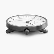 Side view of the brushed gunmetal case and short angular lugs.