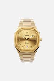 Front view of the octagonal watch with gold-tone Arabic numeral dial on its integrated bracelet