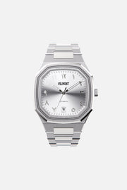 Front view of the octagonal watch with silver Arabic numeral dial on its integrated bracelet