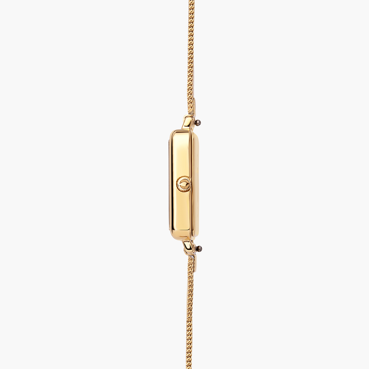 Thin side view of the gold case with its crown and mesh band.