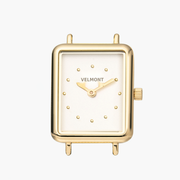 The rectangular gold-tone case alone, showing the white dial and wire lugs.