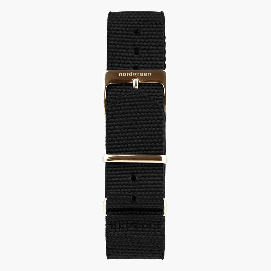 Black nylon strap with a warm rose gold-tone buckle, shown laid out vertically.