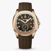 Rubber strap watch with rose gold-tone case and brown grid dial, front view