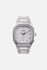 Front view of the octagonal watch with white Arabic numeral dial on its integrated bracelet