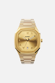 Front view of the octagonal watch with gold-tone Arabic numeral dial on its integrated bracelet